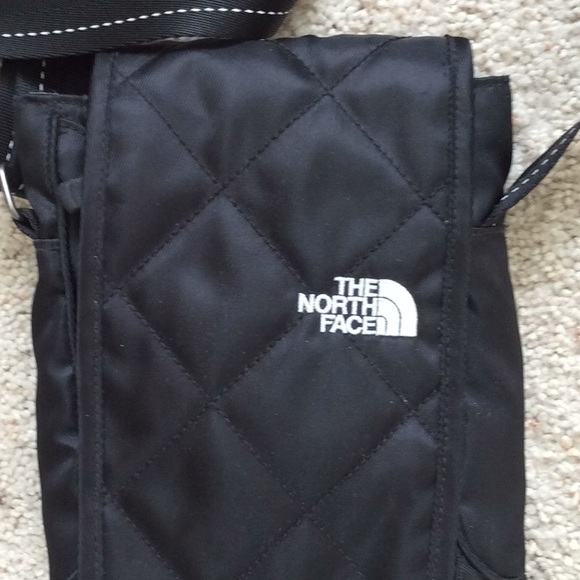 The North Face Handbags - The North Face small quilted crossbody. Black.